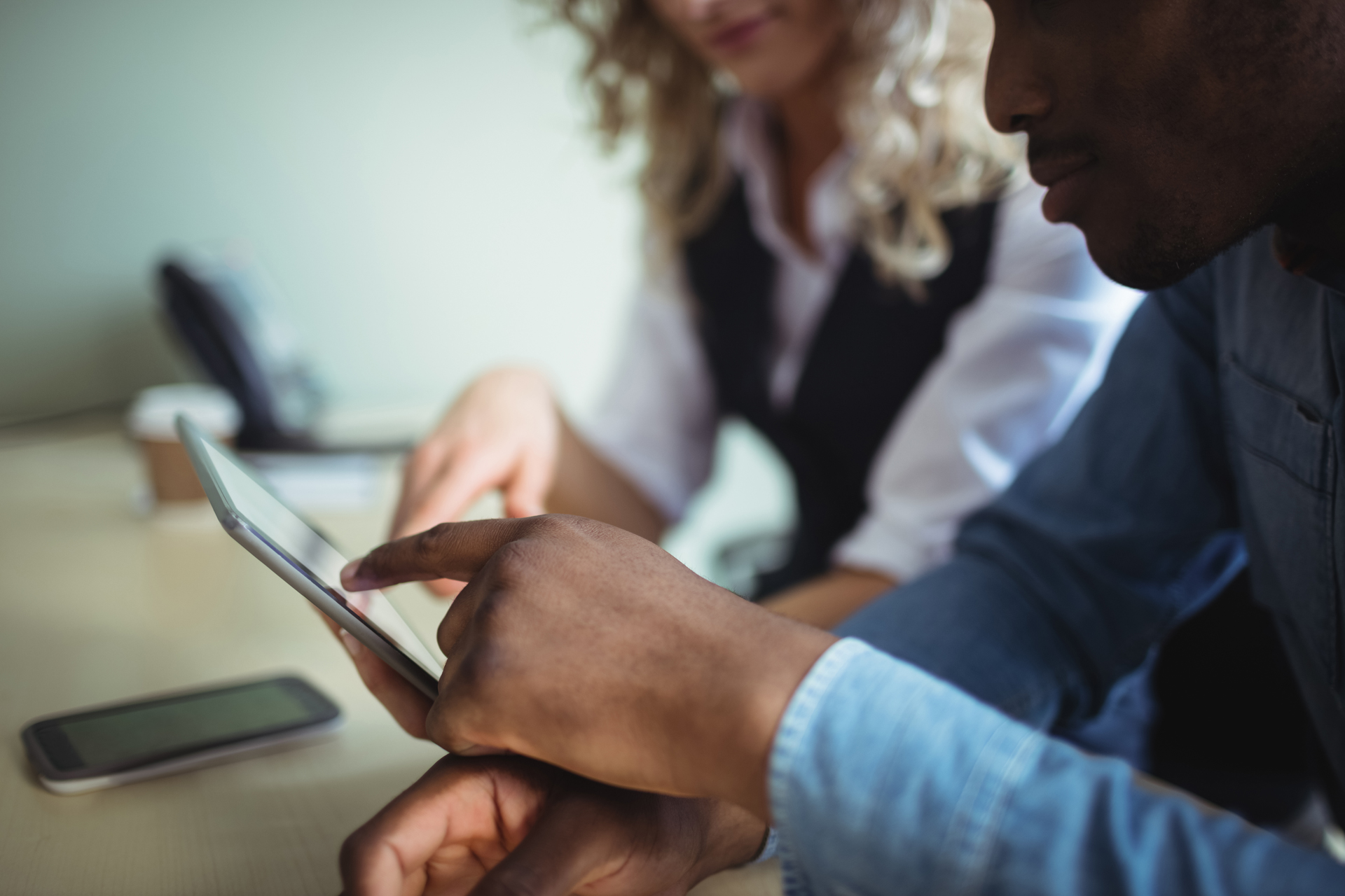 business-executives-discussing-digital-tablet2